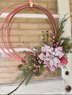 a wreath is hanging on the front door