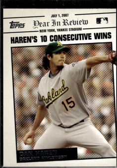 a baseball card with a man throwing a ball in the middle of it's arm