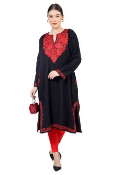 "Kashmiri Aari Embroidered Woolen Pheran.These Pherans Is Made Of Fine Cashmillon Wool Its Embroidered With Aari Work.The Embroidery Done On This Is A Traditional Kashmiri Embroidery Known As 'Aari Work''.It Can Be Matched With Many Outfits  And Pair It Up With A Skirt, Trousers.A Stunningly Marvellous Kurti. These Pherans Features Royal Kashmir Aari Embroidery. Product Details - Condition: Brand New - Handmade - Style: Pheran Tunic - Fabric: Fine Cashmillon Wool - Embroidery: Kashmiri Aari Embr Diwali Embroidered Long Sleeve Kaftan, Embroidered Long Sleeve Kaftan For Diwali, Traditional Long Sleeve Kaftan For Navratri, Long Sleeve Embroidered Kaftan For Diwali, Traditional Semi-stitched Long Sleeve Kaftan, Traditional Tunic With Resham Embroidery For Festivals, Traditional Long-sleeved Kaftan With Zari Work, Festive Traditional Tunic With Resham Embroidery, Traditional Festival Tunic With Resham Embroidery