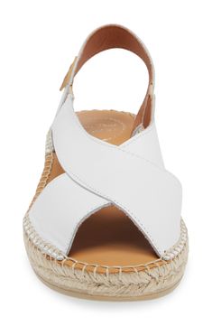 An espadrille-inspired sole enhances the earthy, vintage style of an open-toe sandal featuring smooth leather straps. Leather upper and lining/rubber sole Made in Spain White Ankle Strap Footbed Sandals For Beach, Natural Leather Sole Sandals For Spring, Spring Natural Sandals With Leather Sole, Spring Leather Footbed Slingback Wedge Sandals, Vacation Wedge Sandals With Rubber Sole, Vacation Wedge Heel Sandals With Rubber Sole, Beach Footbed Sandals With Leather Sole, Beach Footbed Sandals With Leather Sole And Open Heel, Natural Leather Wedge Sandals With Cushioned Footbed