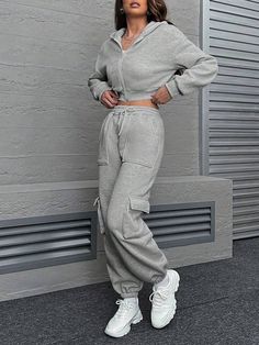 Gray Athleisure Tracksuit For Fall, Gray Casual Winter Tracksuit, Casual Winter Tracksuit With Pockets, Athleisure Long Sleeve Tracksuit With Pockets, Long Sleeve Tracksuit With Pockets In Athleisure Style, Long Sleeve Athleisure Tracksuit With Pockets, Winter Tracksuit With Pockets, Gray Tracksuit With Ribbed Cuffs For Fall, Gray Tracksuit With Pockets For Loungewear