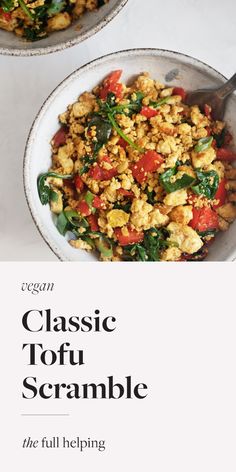 two bowls filled with food sitting on top of a white tablecloth next to each other