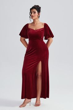 Indulge in elegance with this Velvet V-Neck Luxury Evening Gown. The sumptuous velvet fabric exudes sophistication, while the V-neckline enhances your allure. Designed with a sleek silhouette, this gown offers timeless charm and modern grace. V-neck Velvet Evening Dress, Red Fitted Floor-length Velvet Dress, Fitted Floor-length Red Velvet Dress, Fitted Red Velvet Floor-length Dress, Red Velvet V-neck Evening Dress, Fitted V-neck Velvet Holiday Dress, Velvet V-neck Evening Dress, Velvet V-neck Evening Dress For Gala, Glamorous Velvet V-neck Dress