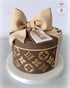 a cake with a bow on top of it