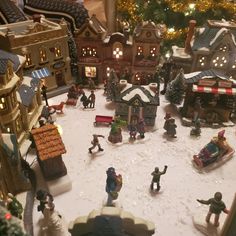 a christmas village with lots of toys and lights