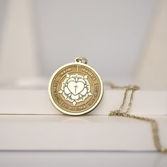 Embrace your faith with this beautiful handmade Lutheran Rose Necklace. This gold pendant features the iconic Lutheran Rose symbol intricately engraved on it. Ideal for those who want to express their Christian faith through their jewelry, this pendant makes a meaningful and stylish accessory. Features: Material: 14K Solid Gold - 10K Solid Gold - 925K Silver - 925K Gold Filled  Design: Detailed engraving of the Lutheran Rose symbol Packaging: Comes in a beautiful gift box, ready for gifting Spir Spiritual Medallion Jewelry With Engraving Option, Personalized Gold Spiritual Jewelry And Charms, Spiritual Engraved Yellow Gold Medallion Necklace, Engraved Yellow Gold Spiritual Medallion Necklace, Engraved Spiritual Medallion Jewelry, Spiritual Pendant Necklaces With Engraving Option, Spiritual Pendant Necklace With Engraving Option, Gold Spiritual Jewelry And Charms For Blessing, Engraved Rose Gold Spiritual Necklace