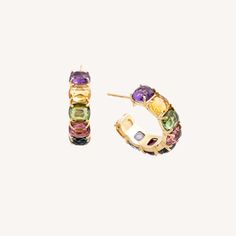 Carefully selected multicolored gemstones give character and brilliance to these magnificent earrings. The 18K yellow gold is finely hand-engraved with the ancient Florentine technique. Luxury Hoop Multi-stone Jewelry, Luxury Multi-stone Hoop Jewelry, Luxury Gold Hoop Earrings With Multi-stone, Luxury Gold Multi-stone Hoop Earrings, Elegant Multicolor Gemstone Hoop Earrings, Elegant Multicolor Hoop Jewelry, Multicolor Gemstone Hoop Earrings In Fine Jewelry Style, Luxury Gold Gemstone Hoop Earrings, Luxury Gold Hoop Earrings With Gemstone