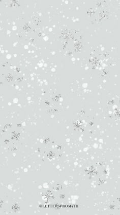 an image of snow flakes on a gray background with the words let it snow