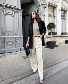 11 Chic Parisian Spring Style Outfits Seen In Paris | Le Chic Street Spring Style Outfits, Parisian Spring, Parisian Wardrobe, Dress Like A Parisian, Elegant Classy Outfits, High Waisted Dress Pants, Parisian Chic Style, Parisian Women, Professional Outfits Women