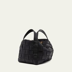 Bottega Veneta "Cassette" top handle bag in intreccio leather  Flat top handles  Removable, adjustable shoulder strap Can be worn as a top handle or shoulder bag  Zip top closure  Interior, zip pouch bag  Approx. 8.7"H x 5.1"W x 6.3"D Made in Italy Luxury Top Handle Box Bag With Braided Handles, Luxury Box Bag With Braided Top Handle, Leather Box Bag With Braided Handles, Modern Top Handle Bag With Intrecciato Weave, Evening Top Handle Satchel With Intrecciato Weave, Evening Satchel With Intrecciato Weave And Top Handle, Modern Bags With Intrecciato Weave And Top Handle, Top Handle Bucket Bag With Intrecciato Weave, Top Handle Bucket Bag With Intrecciato Weave For On-the-go