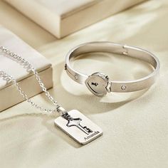 Buy 3 items from my shop and you will get free shipping Express your love with this Custom Engraved Concentric Lock Bracelet Key Necklace Set. Made of high-quality materials, this unique couple gift features a stunning concentric design that symbolizes the deep connection between two souls. Personalize the lock and key with your own engravings to make it truly special. Perfect for anniversaries or as a romantic gesture, this matching set serves as a meaningful keepsake of your relationship. Order now and cherish your love forever!Keywords: Engraved lock, key necklace, couple gifts, personalized jewelry, concentric design, custom engraving, romantic accessories, matching set, love symbol, anniversary present, relationship token, meaningful keepsake handmade jewelry Couples Stainless Steel Friendship-themed Jewelry, Couples Metal Jewelry For Gifts, Couples Stainless Steel Jewelry For Friendship, Couples' Metal Jewelry Gift, Silver Couples Jewelry Gift, Couples Silver Jewelry Gift, Silver Couples Jewelry As A Gift, Couples' Silver Jewelry Gift, Couples Bracelet Jewelry For Valentine's Day