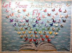 an open book with butterflies flying out of it and the words let your imagination fly