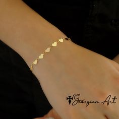 "This beautiful Heart Bracelet features mini mirrored hearts all the way around the wrist! Classic item for every woman! Great gift for Christmas, Mother's Day, Wedding, Baby Shower, Birth of a Child, Valentine's Day, etc. Metal: * 14K Solid Yellow Gold Heart Width : 5mm Clasp: Lobster Claw Length: 7\" ------PRODUCTION TIMELINE-------- Please Allow 1-2 Weeks for Production Shipping Options Available at Checkout" Heart-shaped Charm Bracelet For Wedding, Double Heart Bracelet For Mother's Day, Valentine's Day Heart Bracelet For Wedding, Rose Gold Chain Bracelet With Heart Charm, Minimalist Heart Beads Bracelet, Dainty Heart Bracelet With Jubilee Style, Dainty Heart Bracelet For Valentine's Day, Elegant Valentine's Day Heart Bracelet, Gold Double Heart Bracelet