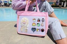 "Large Ita bag has lots of room to display pins. Size: Length15.5 \"   Width: 4.5''  Height11.5''  Handle: 8'' Strap: 24\" Size: Length37cm  Width8cm   Height:30cm ❤Free gift❤     For every purchase,  we will select some popular anime pins for gifts.  Display growing pin collection on the go. with your favorite pins, patches, buttons, charms, key chains, stickers, or pictures. ❤SHOW OFF PIN COLLECTIONS With this stylish ita Tote Bag you can show off your fandom, your travel pics or even your pet Cute Rectangular Bag With Zipper Pouch, Pink Harajuku Shoulder Bag For Gift, Harajuku Style Pink Shoulder Bag As Gift, Pink Harajuku Style Shoulder Bag For Gift, Harajuku Style Pink Shoulder Bag For Gift, Kawaii Satchel Bag For Gifts, Pink Kawaii Bag With Zipper Pouch, Harajuku Style Tote Bag As Gift, Harajuku Style Tote Bag For Gifts