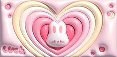 a pink heart with a white bunny in it's center and the words luck written below