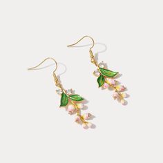 Adorn your ears with the exquisite Lily of the Valley Earrings, crafted with real diamonds and a graceful design. These sparkling accessories enhance any ensemble with an aura of luxurious sophistication, sure to set you apart from the rest. DETAILS Plating: 18K Gold on Brass,  Enamel Materials:   18K Gold on Brass, Cubic Zirconia,  Enamel Size: 2.17"(5.5cm) Weight: 7.48g/pr Elegant Enamel Drop Flower Earrings, Elegant Enamel Flower Shaped Jewelry, Gold Enamel Flower Earrings For Wedding, Elegant Rose Gold Enamel Jewelry, Elegant Enamel Dangle Earrings, Elegant Enamel Dangle Jewelry, Elegant Enamel Earrings For Wedding, Elegant Enamel Wedding Earrings, Enamel Flower-shaped Jewelry For Wedding