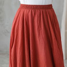 "you can wear it as a casual skirt for travelling, having a picnic with your friends, dating and shopping, Perfect for lazy days that you want to sustain a chic and stylish appearance. DETAIL * 75% linen, 25% cotton * Cotton liner * Elastic waistband * Without pockets * pleated waist detail * Plus size skirt * Circle skirt * Perfect summer spring skirt * Dry clean * The model is 170cm (5′7″) tall with a 80cm (31.5\") bust, 66cm (26\") waist. She is wearing the skirt in size XS/S in red (color 1) Summer Plain Relaxed Fit Skirt, Bohemian Long Skirt In Solid Color, Casual Red Gathered Skirt, Plain Summer Skirt, Bohemian Gathered Skirt In Solid Color, Bohemian Gathered Skirt Solid Color, Bohemian Solid Color Gathered Skirt, Flowy Orange Maxi Skirt With Elastic Waistband, Casual Solid Color Gathered Skirt