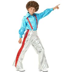 a young boy dressed in an elvis costume, pointing at something with his right hand