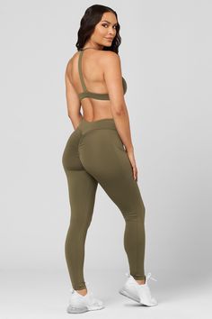 Our customer favorite! Experience style and comfort all in one with the V-Cut Scrunch Legging. Crafted with buttery-soft fabric and a V-cut waistband flatters your shape and hugs all your curves. The details: Buttery-soft fabric Butt Scrunch No front seam Quick-dry fabric V-cut waistband Hidden waistband pocket 4-Way stretch 75% nylon / 25% spandex Stretch Ruched Activewear For Gym, Solid Ruched Activewear For Yoga, Athleisure Ruched Workout Bottoms, Stretch Activewear With Ruched Back For Workout, Workout Activewear With Ruched Back And Stretch, Sporty Fitted Activewear With Ruched Back, Strappy Bra, Spin Class, Strap Design