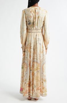 Signature crystals and ornate floral lace decorate this silk-enriched linen maxi dress featuring a gorgeous garden of soft-hued blooms entwined with golden fronds and leopard spots. Australian designer Camilla Franks often takes inspiration from far-flung destinations—case in point: this print pays tribute to the history and natural beauty of Egypt. 57" length (size Medium) Rouleau-button closure V-neck Long sleeves with shirred cuffs Unlined 82% linen, 18% silk Dry clean Imported Designer Cloth Lace Trim Long Sleeve, Silk Maxi, Leopard Spots, Linen Maxi Dress, Gorgeous Gardens, Silk Maxi Dress, Australian Design, Nordstrom Dresses, Floral Lace