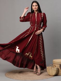 Maroon Georgette Anarkali suit and pants set with golden cutwork. The intricate details and luxurious materials make this ensemble a truly special piece to add to your wardrobe. Every detail has been thoughtfully crafted to elevate your style to the next level. Elegant Floor-length Kurta With Cutdana, Elegant Floor-length Cutdana Kurta, Elegant Floor-length Kurta For Navratri, Gold Designer Dress For Navratri, Elegant Floor-length Kurta With Pallu, Festive Floor-length Kurta With Resham Embroidery, Long Festive Dresses With Cutdana, Festive Long Dresses With Cutdana, Anarkali Maxi Length Festive Sets