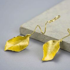 Metals Type: 18k Gold/925 Sterling Silver , Girls, Teen Includes The Box As A Gift. Care Instruction: Avoid Heat & Chemicals Like Perfume, Alcohol, Etc And Clean With Dry Cotton. We Offers An Exclusive Collection Of Finest Quality Crafted Fashion Jewelry In Various Colors. We Make Sure That Our Collection Of Gold/Silver Long Fall Leaves Earring High-Quality Are Beautiful, Elegant & Will Surely Galvanize You, Yellow Gold Leaf-shaped Formal Jewelry, Formal Yellow Gold Leaf-shaped Jewelry, Formal Yellow Gold Leaf Jewelry, Yellow Gold Leaf-shaped Jewelry Gift, Yellow Sterling Silver Single Earring, Elegant Sterling Silver Leaf-shaped Jewelry, Elegant Sterling Silver Leaf Jewelry, Sterling Silver Leaf-shaped Jewelry In Yellow Gold, Gold Leaf-shaped Earrings For Gift