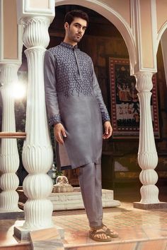 Grey full sleeve kurta with thread mix embroidery in hexagon pattern. Paired with pant.
Components: 2
Pattern: Embroidery
Type Of Work: Thread
Neckline: Mandarin collar
Sleeve Type: Full sleeves
Fabric: Cotton Silk, Lining: Cotton
Color: Grey
Other Details: 
Side slit kurta
Occasion: Sangeet - Aza Fashions Kurta Pants, Kurta Set For Men, Men Kurta, Mens Kurta Designs, Mens Kurta, Hexagon Pattern, Pattern Embroidery, Kurta With Pants, Silk Embroidery