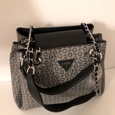 Guess Bag,Los Angeles -Style:Sv510106 -Color:Black -Group:Ronan -Mrsp:$159 Original New Guess Purses Handbags, Luxury Gray Satchel Bag, Black Top Handle Bag With Branded Hardware, Luxury Gray Shoulder Bag With Double Handle, Silver Top Handle Bags With Gunmetal Hardware, Luxury Gray Evening Bag, Designer Gray Bags For Daily Use, Designer Gray Top Handle Shoulder Bag, Designer Gray Rectangular Shoulder Bag