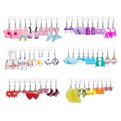 several pairs of earrings hanging from hooks