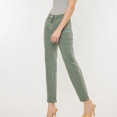 Introducing our Ultra High Rise 90's Olive Straight Jeans, a fashionable and versatile addition to your denim collection. These jeans feature an ultra high-rise waist and are crafted from comfortable stretch denim, ensuring a flattering fit. With a zipper fly and an olive color dye, these jeans exude a trendy and chic look. Their straight leg design adds a touch of classic style to any outfit. Front Rise: 12"Inseam: 27.5" in size 5/26 Fabric Contents: Fabric Composition: 99.3% Cotton, 0.7% Spand Chic Olive Straight Leg Bottoms, High Rise Solid Relaxed Fit Jeans, Solid High Rise Relaxed Fit Jeans, Casual High Rise Cropped Mom Jeans, Casual High Rise Mom Fit Cropped Jeans, Casual High Waist Olive Bottoms, Spring Mom Fit Jeans With Tapered Leg, Spring Mom Fit Tapered Leg Jeans, Solid Color Tapered Leg Jeans With Five Pockets