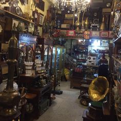 a room filled with lots of antique items