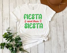 Fiesta And Then Siesta Shirt, Cinco De Mayo shirt, Mexican Party Shirt, Funny Shirt, Funny Gift, Mexican Festival Shirt, Fiesta Party * Processing time is 1 business day (there may be exceptions during holiday seasons). Delivery time is based on your shipping type selection and location. Please check the estimated delivery times at checkout and upgrade the shipping at checkout if you need it sooner. * All items are made-to-order. Because of the nature of these items, unless they arrive damaged o White Crew Neck Shirt For Cinco De Mayo, Casual Festive Tops For Festivals, Casual Crew Neck Top For Fiesta, Mexican Festival, Fiesta Shirt, Festival Shirt, Mexican Party, Festival Shirts, Fiesta Party