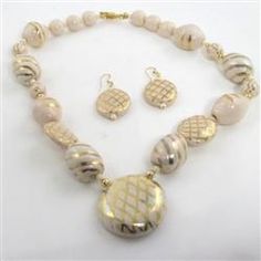 Ivory Handmade Kazuri Fair Trade Pendant Necklace Elegant Beige Jewelry With Large Beads, Elegant Cream Jewelry With Large Beads, Beige Large Beads Jewelry Gift, Handmade Cream Jewelry For Jewelry Making, Cream Jewelry With Large Beads As A Gift, Cream Jewelry With Large Beads For Gift, Traditional Cream Jewelry For Gifts, Traditional Cream Jewelry Gift, Cream Costume Jewelry As Gift