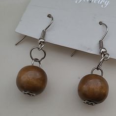 Natural Wood Bead Ball Drop French Hook Dangle Fashion Vacation Earrings. New, Still On The Card. New To Poshmark? Sign Up With Code Banannie0 To Get $10 Off Your First Order! Free Shipping If This Is Your First Purchase From Poshmark! Beige Jewelry With Dangling Beads For Gift, Beige Jewelry With Dangling Beads As Gift, Nickel Free Brown Beaded Drop Earrings, Nickel-free Brown Beaded Drop Earrings, Nickel-free Brown Drop Beaded Earrings, Nickel-free Brown Beaded Dangle Earrings, Brown Nickel-free Dangle Beaded Earrings, Brown Dangling Beads Jewelry For Gift, Brown Drop Earrings With Ear Wire