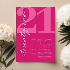 a pink 21st birthday party card with white flowers