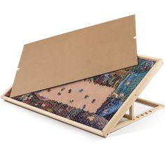 PRICES MAY VARY. Premium Material - Lavievert puzzle board is processed out of quality pinewood, sturdy and durable. The suede covering ensures enough friction to effectively prevent puzzle pieces from sliding or falling even if the board tilts at a certain angle. Five Angle Adjustments - Comes with 5 angle adjustments ranging from 0° to 30°. There is always a right angle for you to abate stress and fatigue in your neck, waist or back, and thus your health is ensured and attention is focused on Jigsaw Puzzle Table, Jigsaw Puzzle Accessories, Puzzle Storage, Puzzle Table, Human Centered Design, Wooden Jigsaw Puzzles, Wooden Jigsaw, Puzzle Board, Miniature Gift