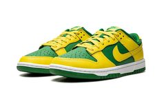 The Nike Dunk Low “Reverse Brazil” is a two-tone, yellow-and-green colorway of the retro basketball shoe that flips the color scheme of the model’s popular “Brazil” style.  As its name suggests, the “Reverse Brazil” reverses the color coordination of the “Brazil” Dunk, and it doesn’t miss the mark.  The shoe features Yellow Strike leather overlays and Swoosh branding on an Apple Green-colored leather base.  A green “Nike” logo is embroidered on the yellow leather heel tab.  Classic “Nike” detail Brazil Dunks, Brazil Style, Green Jordans, Adidas Sl 72, Sb Dunks, Sneakers Box, Color Coordination, Kobe Shoes, Retro Basketball Shoes