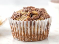 a muffin sitting on top of a white counter