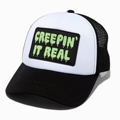 Claire's "Creepin' It Real" Glow in the Dark Trucker Hat Black Halloween Trucker Hat, Halloween Snapback Baseball Cap For Streetwear, White Novelty Hat For Halloween, Halloween Streetwear Baseball Cap, Adjustable Halloween Hats For Streetwear, Trendy Halloween Cap Hat, Novelty Snapback Hat With Letter Print For Streetwear, Novelty Letter Print Snapback Hat For Streetwear, Trendy Halloween Cap