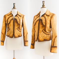 RARE 1960's Adam and Eve Leather Jacket * XS/S MEASUREMENTS: SHOULDERS: 16" CHEST: up to 35"-snug 36" WAIST: measures up to 32" laying flat but best recommended for 26-28" waist size  BOTTOM HEM: up to 32" LENGTH: 17.5" SLEEVE LENGTH: 23" fits like women's XS/S or men's XS A rockstar-worthy, 1960's leather masterpiece, by Toronto-based label Adam and Eve. These rare jackets are the Canadian-version of the infamous East West Musical Instruments leather jackets from the same time period. This butt Retro Fitted Leather Jacket For Fall, Fitted Retro Leather Jacket For Fall, Vintage Fitted Leather Jacket For Work, Retro Fitted Leather Jacket, Fitted Vintage Leather Jacket, Fitted Retro Leather Jacket For Workwear, Adam And Eve, Baby Bag, 1960s