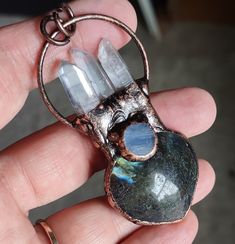 1 Large Natural Labradorite Kyanite and Quartz Gemstone Heart Pendant. Very magical and would make a great pendant for the Renaissance Festival. You will receive the actual pendant shown here in the listing. I am making individual listings for the pendants because they are all slightly different. There are also 2 jump rings that you can remove if you want, or use them to complete your necklace or project. Labradorite is a highly mystical and protective stone. It enhances intuition, promotes spiritual growth, and strengthens psychic abilities. Labradorite also brings balance and harmony to the aura, protects against negative energies, and encourages self-discovery and self-expression. About 70mm tall and about 35mm wide. (about 2-3/4" x 1-3/8") a little over 10mm deep. Balance And Harmony, Heart Gemstone, Psychic Abilities, Crystal Points, Spiritual Growth, Self Discovery, Jump Rings, Heart Pendant, Jewelry Inspiration