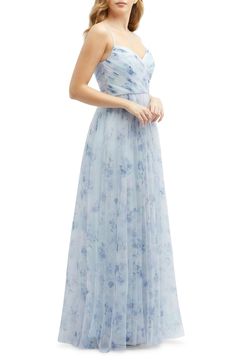 Dreamy blooms and ruched details define a gown that feels like it should come with glass footwear and a pumpkin coach. 55 1/2" length Hidden back-zip closure Surplice V-neck Lined 100% polyester Dry clean Imported Spring Gown With Ruched Fitted Bodice, Spring Wedding Gown With Ruched Detail, Garden Bridesmaids Dresses, Light Blue Bridesmaid Dresses, Light Blue Bridesmaid, Floral Bridesmaid Dresses, Dessy Collection, Chic Scarves, Mismatched Bridesmaid Dresses