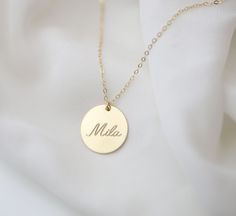 Personalized large circle disk tag necklace in Gold filled or Sterling silver. Have this custom necklace personalized with your child's name, your name, initials or any meaningful word of your choice. This necklace is perfect for a special meaningful keepsake gift for mom, friend wife or that special someone. OPTIONS Material: SS// for Sterling silver GF// for Gold filled Disk size : 16mm // 19mm Cubic Zirconia charm: You can choose from the drop down bar menu to add a 4mm CZ charm PLEASE READ B Everyday Adjustable Charm Necklace With Custom Name, Everyday Adjustable Custom Name Charm Necklace, Everyday Adjustable Custom Name Charm Necklaces, Everyday Adjustable Charm Necklaces With Custom Name, Customized Minimalist Name Necklace, Minimalist Customizable Necklace As Personalized Gift, Personalized Minimalist Pendant Charm Necklace, Minimalist Custom Name Charm Necklace Adjustable, Minimalist Personalized Pendant Charm Necklace