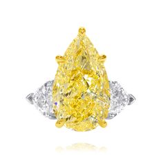 Setting the stage for deep dreaming, we curtailed this design to the vibrancy of fairy tales. The magnificent 10 carat pear shape embodies a beautiful shade of yellow that reminds us of a single petal from Van Gogh's Sunflowers. This ring was created in collaboration with Rosenberg Diamonds & Co. Luxury Yellow Pear-shaped Ring, Elegant Yellow Pear-shaped Diamond Ring, Elegant Gia Certified Teardrop Diamond Ring, Yellow Pear-shaped Diamond Rings, Yellow Diamond Pear-shaped Ring, Luxury Teardrop Center Stone Diamond Ring, Luxury Pear-cut Diamond Ring, Luxury Teardrop Diamond Ring With Center Stone, Gia Certified Pear-shaped Diamond Ring