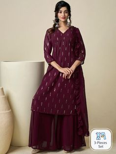 Burgundy embroidered Kurta with Palazzos with dupattaKurta design:Ethnic motifs embroideredA-line shapeRegular styleV-neck, three-quarter regular sleevesNa pockets sequinned detailKnee length length with straight hemGeorgette machine weave fabricPalazzos design:Solid PalazzosPartially elasticated waistbandSlip-on closure