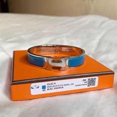 Authentic Herms’ Classic Clic H Bracelet In Blue. Brand New And Never Worn Once. Bought In Hk For $720. Hermes Clic H Bracelet Blue, Designer Blue Bracelet Jewelry, Palladium Hardware Bracelets As Gift, Luxury Blue Bracelet Strap Jewelry, Luxury Blue Bracelet Jewelry, Luxury Blue Jewelry With Bracelet Strap, H Bracelet, Hermes Bracelet, Hermes Jewelry