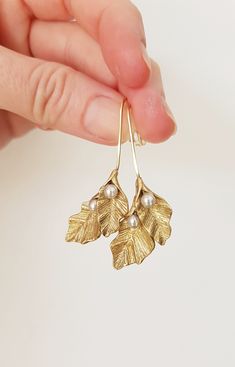 Raw Brass Hoop Earrings with organic shaped shaped leaf pendants with a modern rustic look. Perfect choice for your special outfits, eye catching  and comfortable to wear. Very beautiful natural raw brass color with an antique finish, the leaves have an organic shape and are adorned with small 4 mm Swarovski pearls. They hang gently on short brass ear hooks that I carefully hammered for a natural look.  Raw brass gets more beautiful while it ages, creating an unique patina after each wear. If yo Art Nouveau Wedding, Jewelry Art Nouveau, Nouveau Wedding, Art Nouveau Weddings, Bijoux Art Nouveau, Special Outfits, Brass Hoop Earrings, Wedding Guest Hairstyles, Brass Hoops