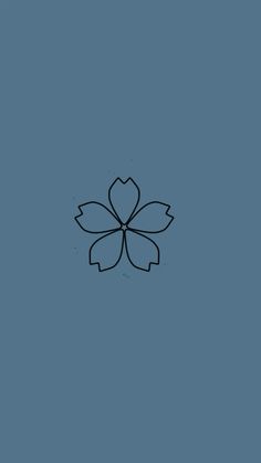 a black and white flower on a blue background