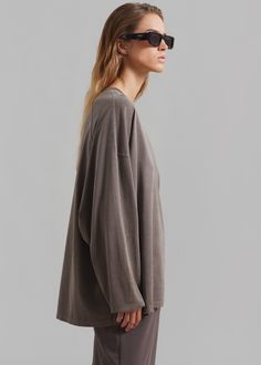 Color: Brown Lightweight cotton fleece Relaxed fit Crew neckline Long sleeves Drop shoulders Slip on style Unlined 100% Cotton Machine Wash Cold By The Frankie Shop. Imported Relaxed Fit Tops For Layering, Basic Long Sleeve T-shirt For Loungewear, Oversized Relaxed Tops For Loungewear, Relaxed Oversized Tops For Loungewear, Long Sleeve Relaxed Fit T-shirt For Loungewear, Long Sleeve Cotton T-shirt For Loungewear, Oversized Cotton Long Sleeve Top For Everyday, Oversized Shirttail Hem Top For Loungewear, Oversized Tops With Shirttail Hem For Loungewear