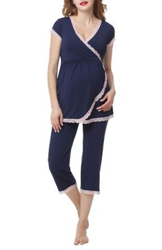 A supersoft pajama top is designed to adapt to your changing body during and after pregnancy with a flattering surplice neckline and Empire waist. A hidden layer along the neck can be pulled aside for easy and discreet nursing. Comfy capri-length pants complete the set. 28" top length; 20 1/2" inseam; 16 1/2" leg opening; 15 1/2" front rise; 17 1/2" back rise Top has surplice V-neck; cap sleeves Pants have elastic/drawstring waist Unlined 95% rayon, 5% spandex Machine wash, tumble dry Imported Belly Pant, Nursing Pajama Set, Maternity Nursing Pajamas, Nursing Pajamas, Nursing Maternity, Maternity Pajamas, Lace Trim Top, C Section, Soft Pajamas